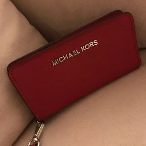 Michael Kors Red leather wristlet.